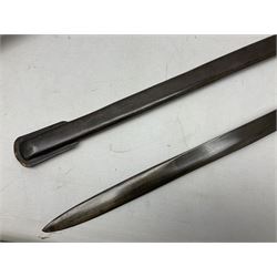 Reproduction Scottish officers basket hilt broad sword, the brass basket pierced with heart-shaped motifs lined with red lining, together with a reproduction Japanese Katana sword, longest L110cm