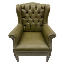 Georgian design wing back armchair, upholstered in studded leather