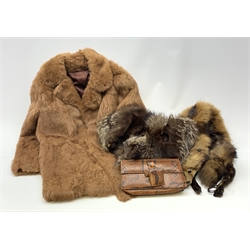 A three quarter length lined fur coat, together with two fox stoles, and a snake skin purse. 