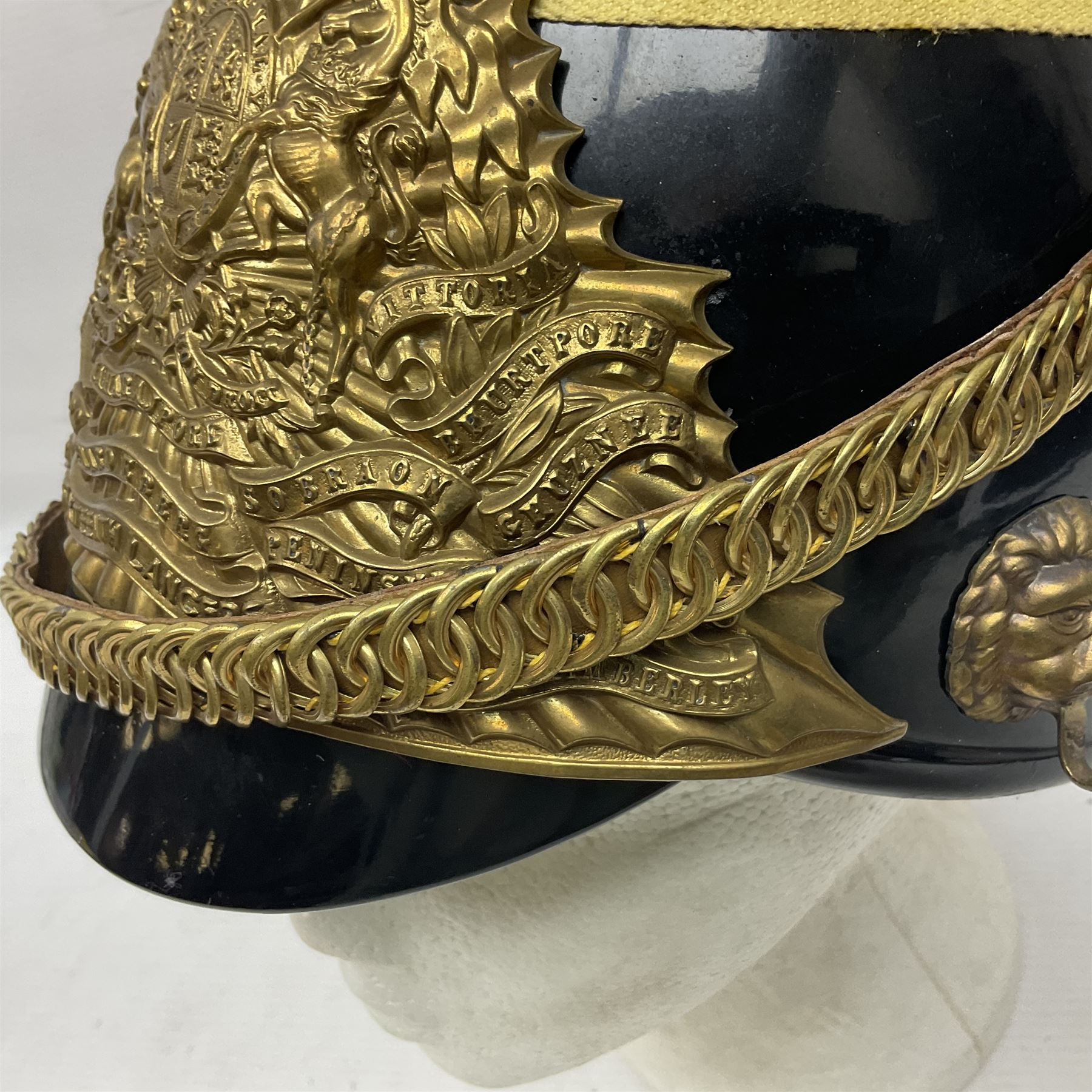 Lancers cap with original 19th century fittings for the 16th Lancers on a modern fibre glass shell with liner