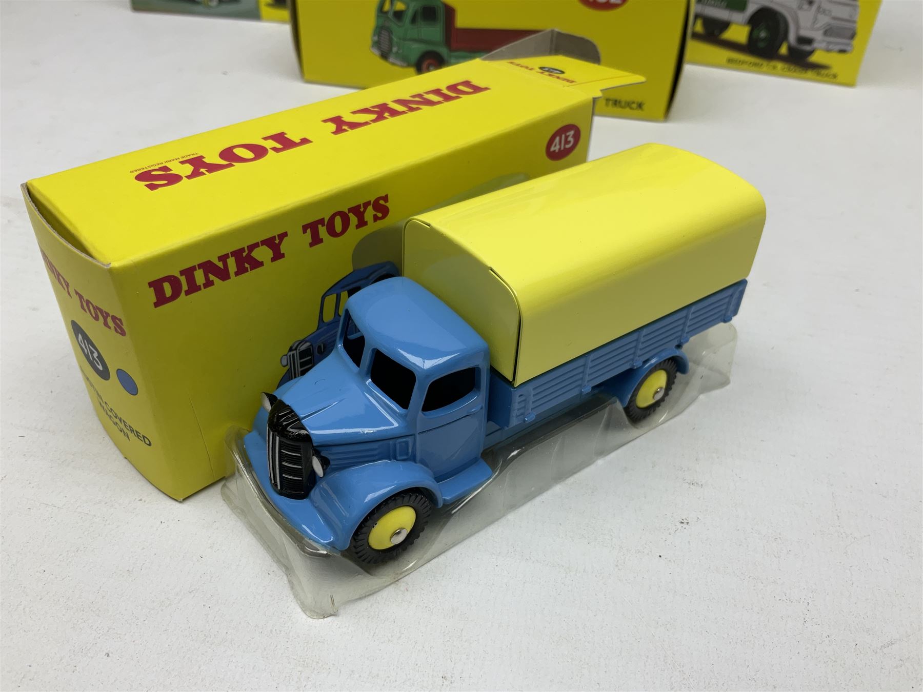 Eight Atlas Dinky die-cast models including, Bedford TK Coal Lorry no. 425, Guy Warrior Flat Truck no. 432, two Guy Van no. 514 and four others, all boxed (8)