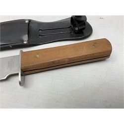 Reproduction non-firing flintlock pistol with brass skull crusher butt, the lock-plate inscribed 'Tower' and 'GR' L40cm; Sabre Japan Original Bowie Knife in sheath; and Indian embossed nickel two-piece walking cane (3)