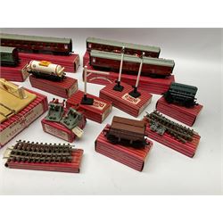 Hornby Dublo - five passenger coaches 4063 x 2, 4078 and 4026 x 2; three goods wagons 4626, 4627 and 4675; quantity of track including switch point, diamond crossings, curved rails, level crossing, signal, buffer stops etc; all boxed; and two packs of lineside signs
