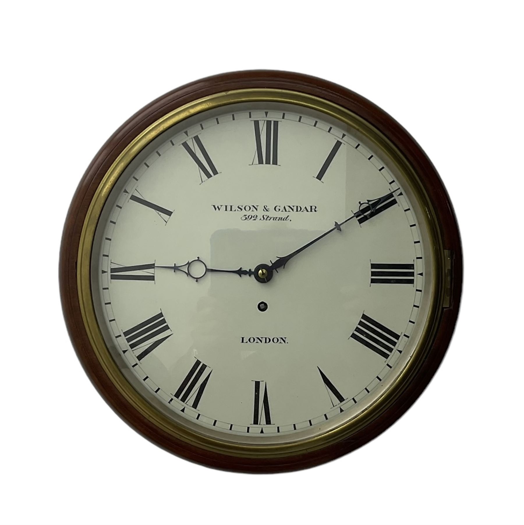 Wilson & Gandar of London -  Fine 19th century fusee timepiece wall clock, mahogany case with a cast brass bezel and 12” painted dial, Roman numerals, minute track and fine pierced moon hands, wire fusee driven movement with curved shoulder movement plates and a recoil anchor escapement. With key and pendulum. Wilson & Gandar are recorded as working in The Strand, London, 1851-75.
