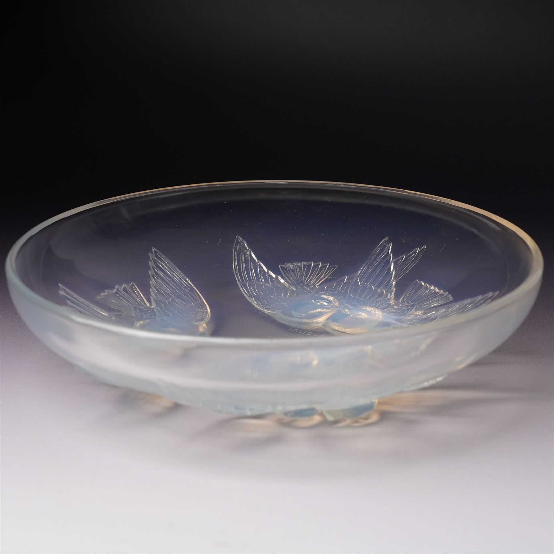 Lalique opalescent glass bowl in the 'Nonettes' pattern moulded with birds, marked R Lalique France D22cm