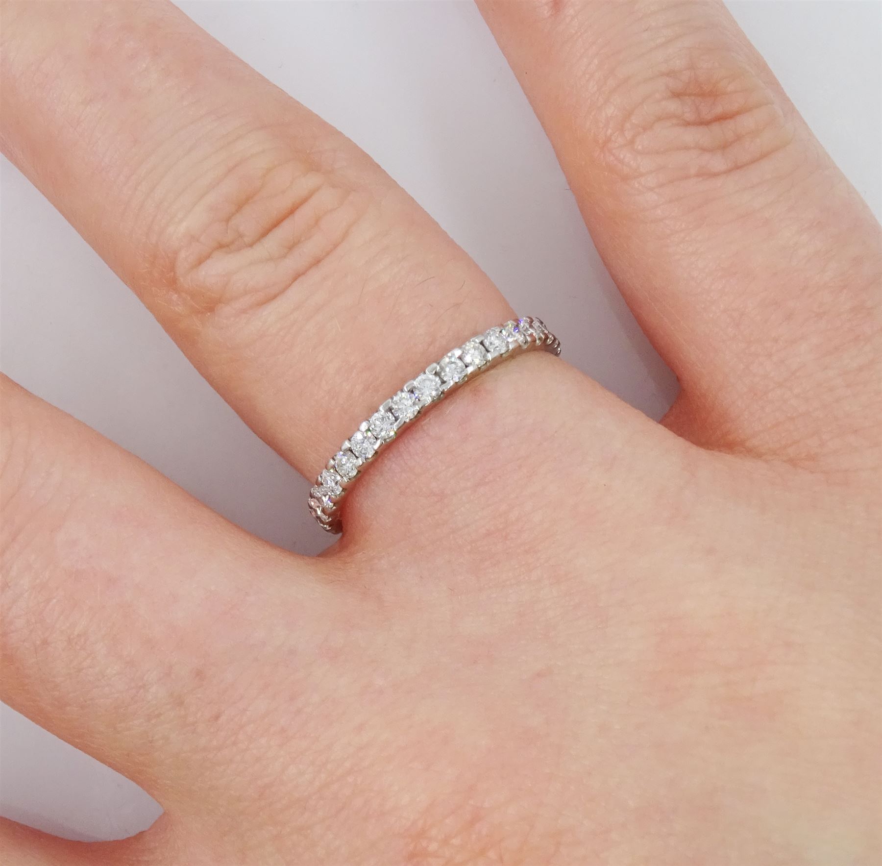 Platinum round brilliant cut diamond half eternity ring, hallmarked
