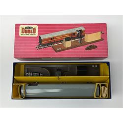 Hornby Dublo - 5080 Signal Cabin with pack of Station Names; two D1 Footbridges, one with instructions; and two 2460 Plastic Level Crossings suitable for two-rail system; 2400 T.P.O. Mail Van Set for two-rail system all boxed; together with three plastic brick effect tunnel mouths for double track layout (9)