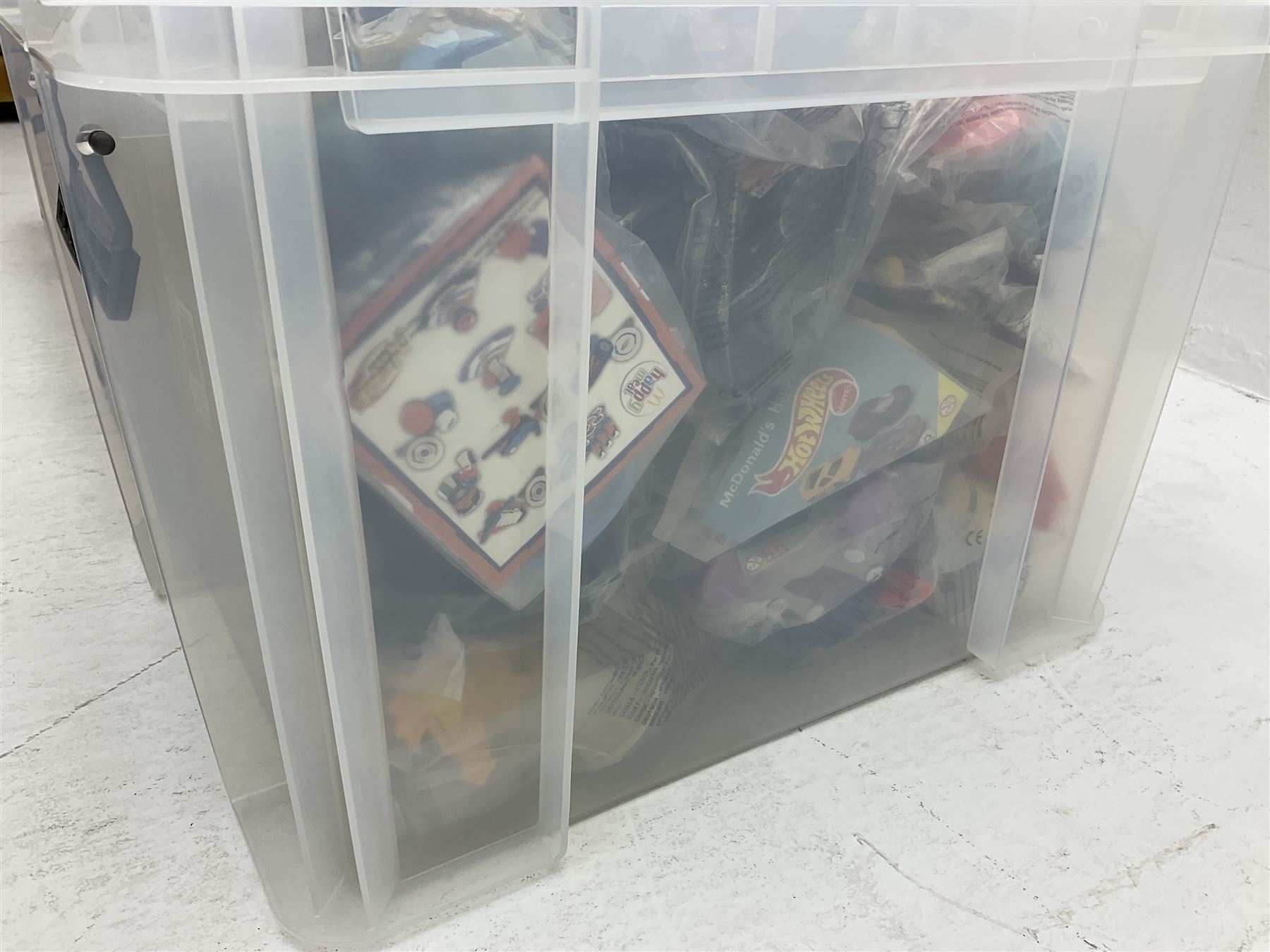 Large quantity of Mcdonalds toys to include Mario in three boxes