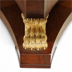 Arthur Brett & Sons - late 20th century twin pedestal dining table in the Second Empire style, the oval Amboyna burl veneered top, bordered with tulipwood crossbanding and delicate floral marquetry inlay, and rosewood crossbanded outer border within gilt gadrooned edge, over two mahogany triform pedestal bases with rosewood crossbanding and decorated with neoclassical marquetry of tied ribbons, leafy sprays, and scrolling acanthus decoration, raised on carved and gilded lion paw terminals on plinth bases, underside with maker's label