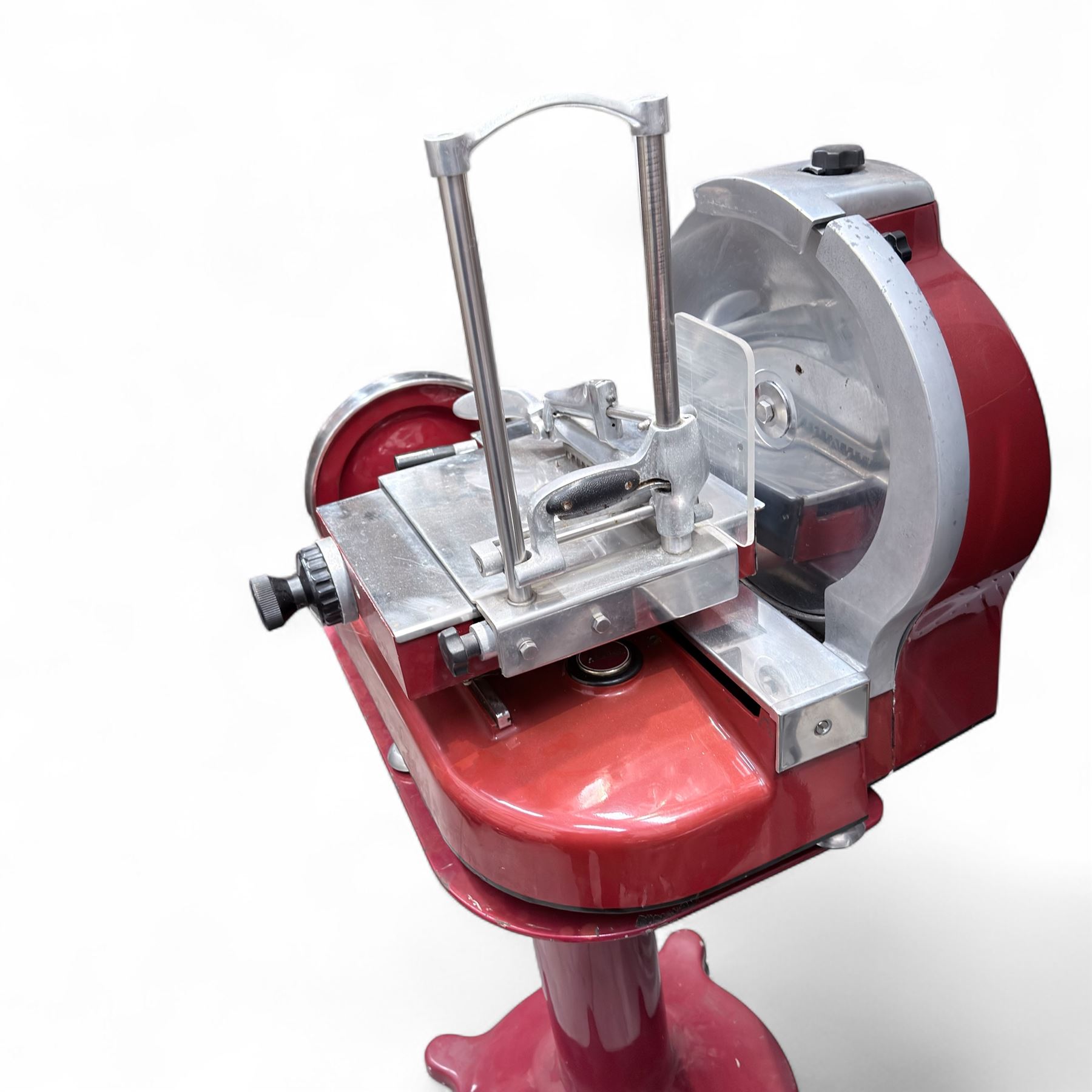 Vintage Berkel 115 NEV meat slicer on pedestal, red finish