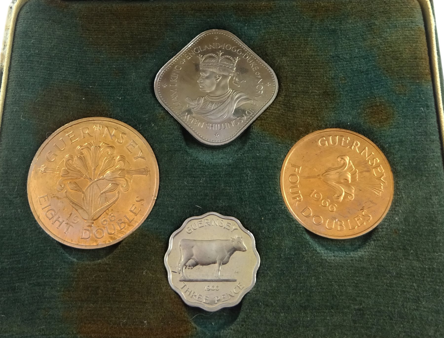  Bailiwick of Jersey 1957 cased four coin set and 1964 cased four coin set, Guernsey 1966 cased four coin set and New Zealand 1967 decimal coins cased seven coin set with coins still sealed in plastic packaging (4)   