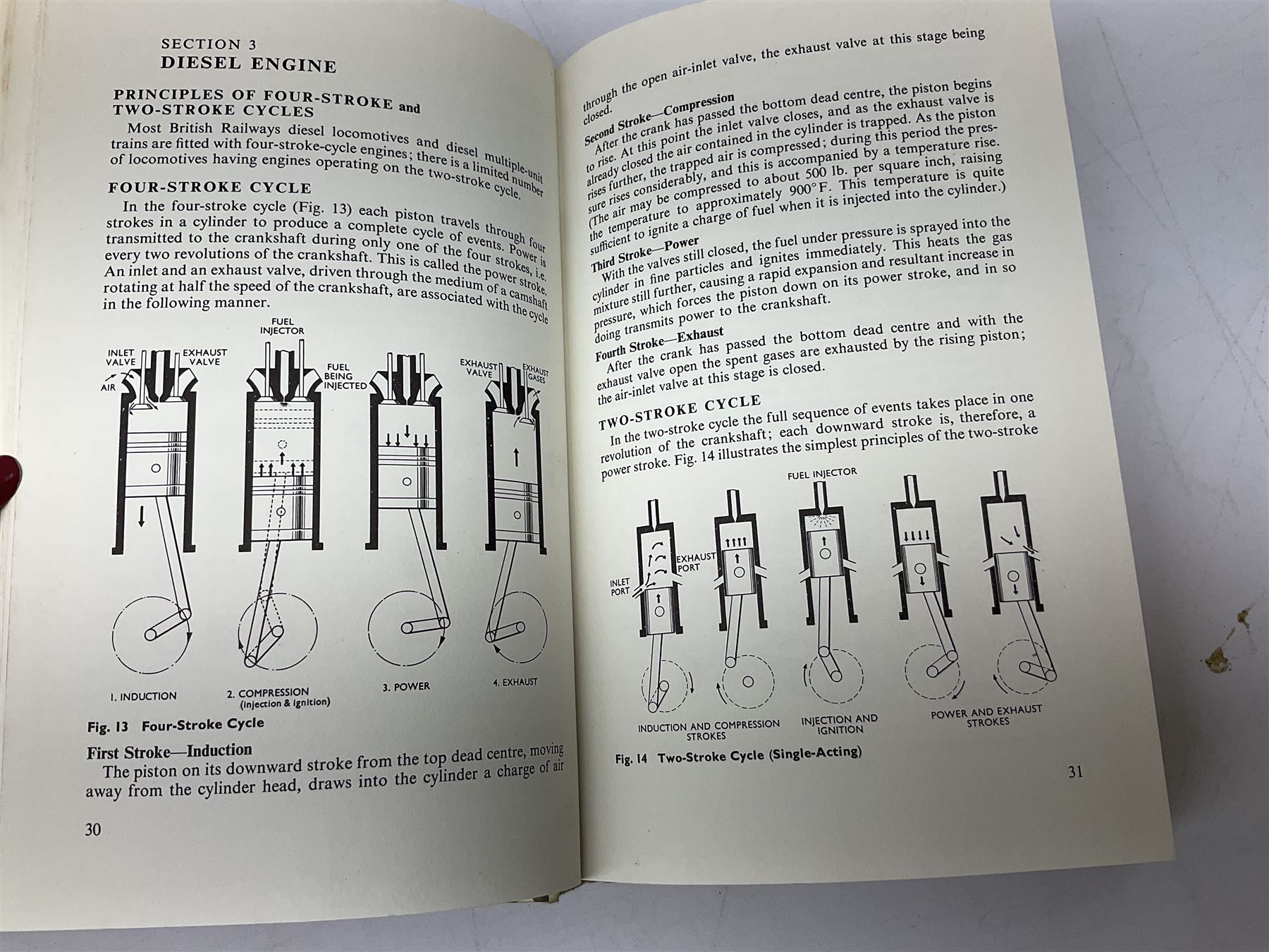 Black painted three colour railway lamp with revolving filters, H29cm; BR Acme Thunderer whistle; three railway peaked caps, two with BR Intercity 125 badge; small album of photographs of railway interest etc