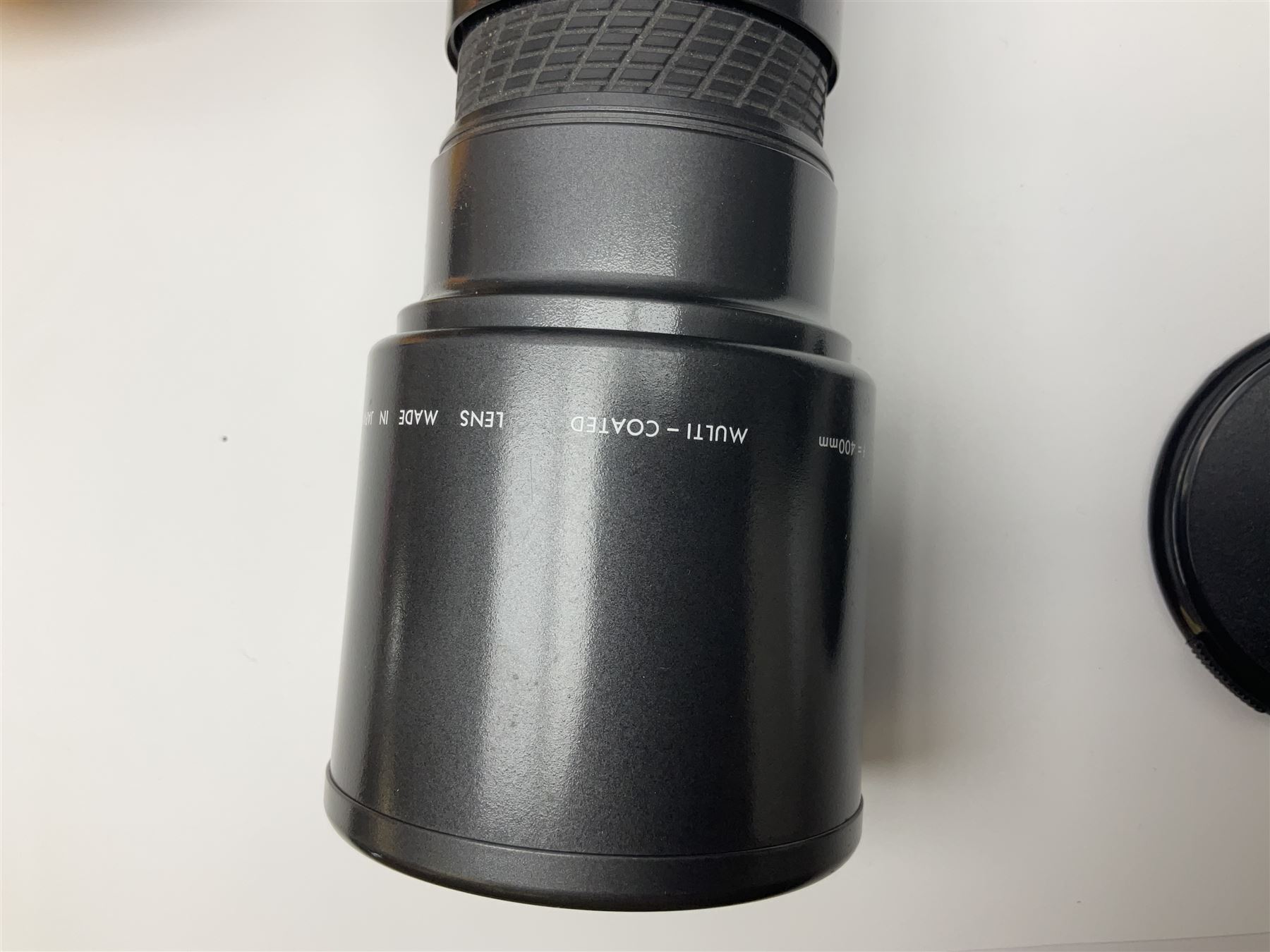 Four camera bodies, to include, Ricoh KR-10 serial no. 38826, Pentax MZ-M serial no. 4185969 with 'SMC Pentax- M 1:3.5 28mm' lens, Canon EOS500 serial no. 080927, with 'Sigma Zoom 100-300mm 1:4.5-6.7 DL'  lens etc, with other camera lenses and equipment 