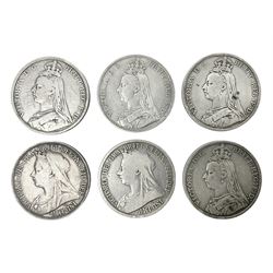 Six Queen Victoria silver crown coins, dated two 1890, two 1891, 1893 and 1896