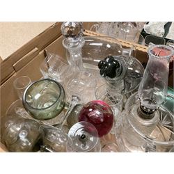Caithness 'Fireball' paperweight, together with four cased Tyrone Crystal glasses, glass oil lamp, three glass decanters etc, in two boxes