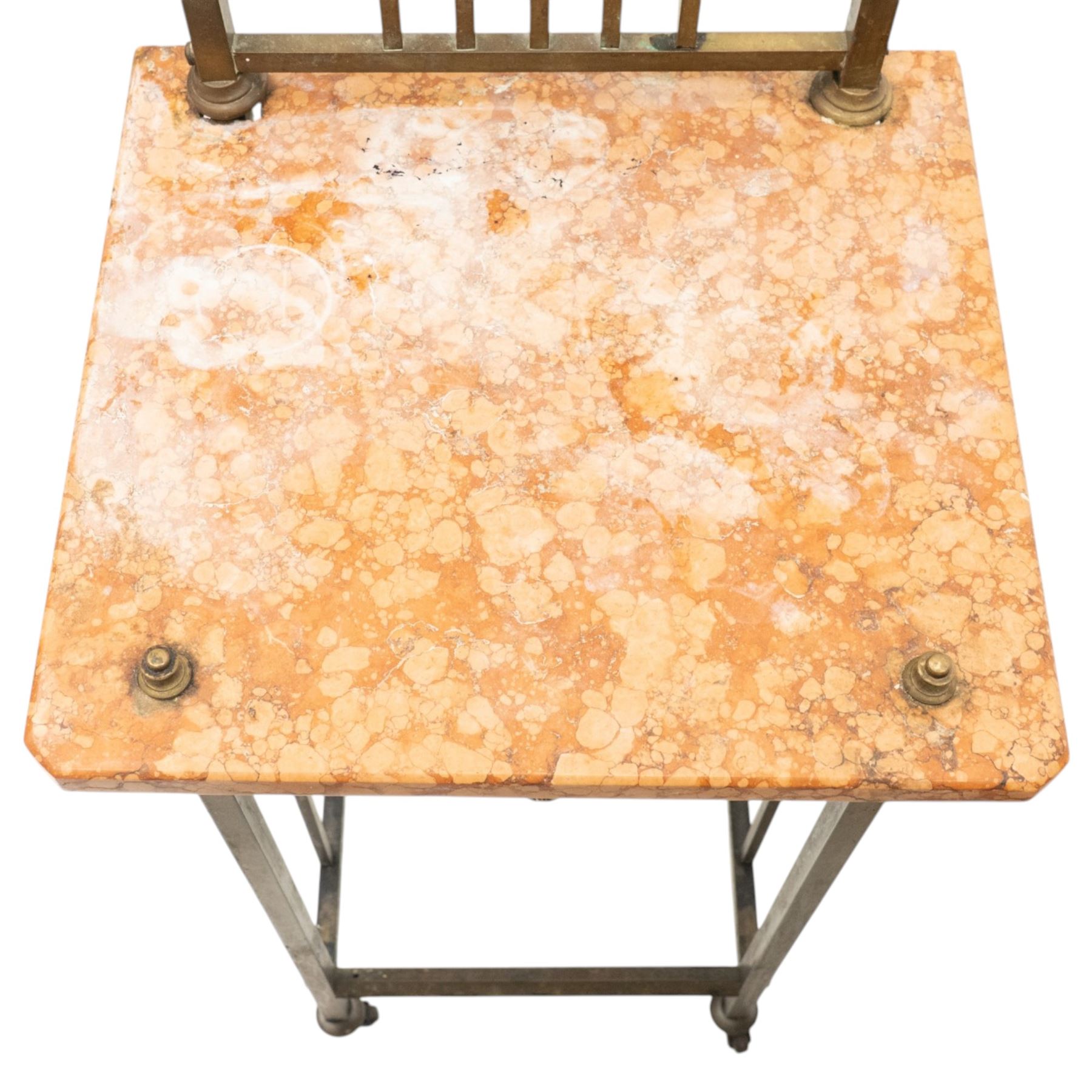 Pair of European Art Deco brass and marble bedside tables, the raised bass back over a canted rectangular marble top, fitted with single drawer decorated with repeating octagonal decoration, raised on square tubular supports with castors, united by undertier