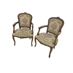 Pair French Louis XV design beech framed salon armchairs, upholstered in tapestry style fabric with sprung seat and studwork border, on cabriole supports