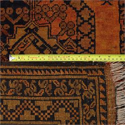 Afghan Ersari hand-knotted rug, apricot field decorated with three large octagonal gul medallions filled with geometric floral motifs, flanked by small tribal devices, end fringe fraying 97x167cm, together with a Baluch prayer rug, decorated with stylized tree motifs arranged in vertical rows beneath a stepped mihrab arch with multiple narrow borders of angular tribal motifs in shades of indigo, brown, and ochre fraying to flatweave ends, 134x84cm, (2)