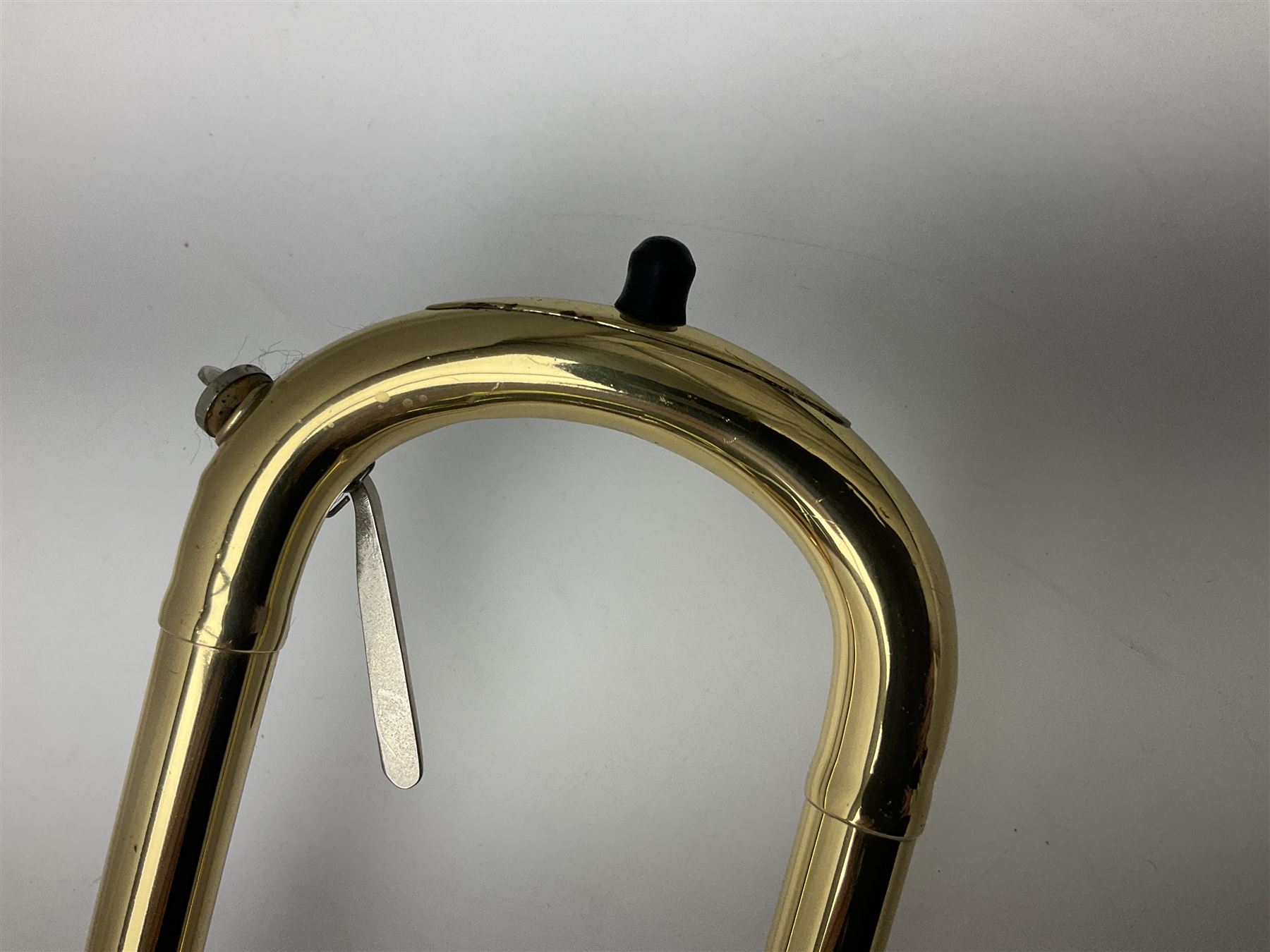 Sebastian Bucklet Aquae Sulis copper and brass trombone No.0910004; in lightweight carrying case; and Kinsman folding tubular chrome music stand in case (2)