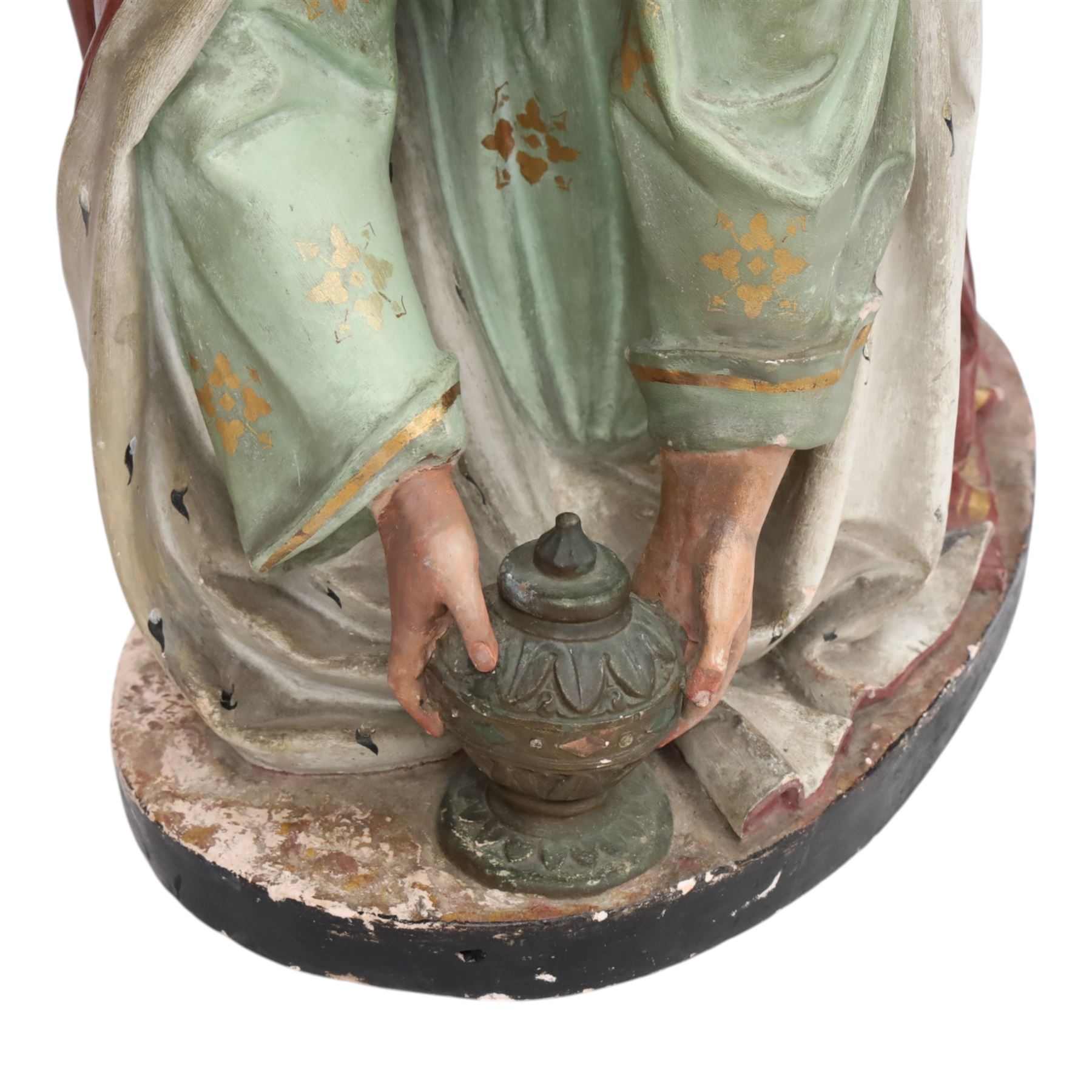 20th century painted plaster icon figure depicting one of the three wise men from a nativity sceen, kneeling and presenting his gift, H54cm 