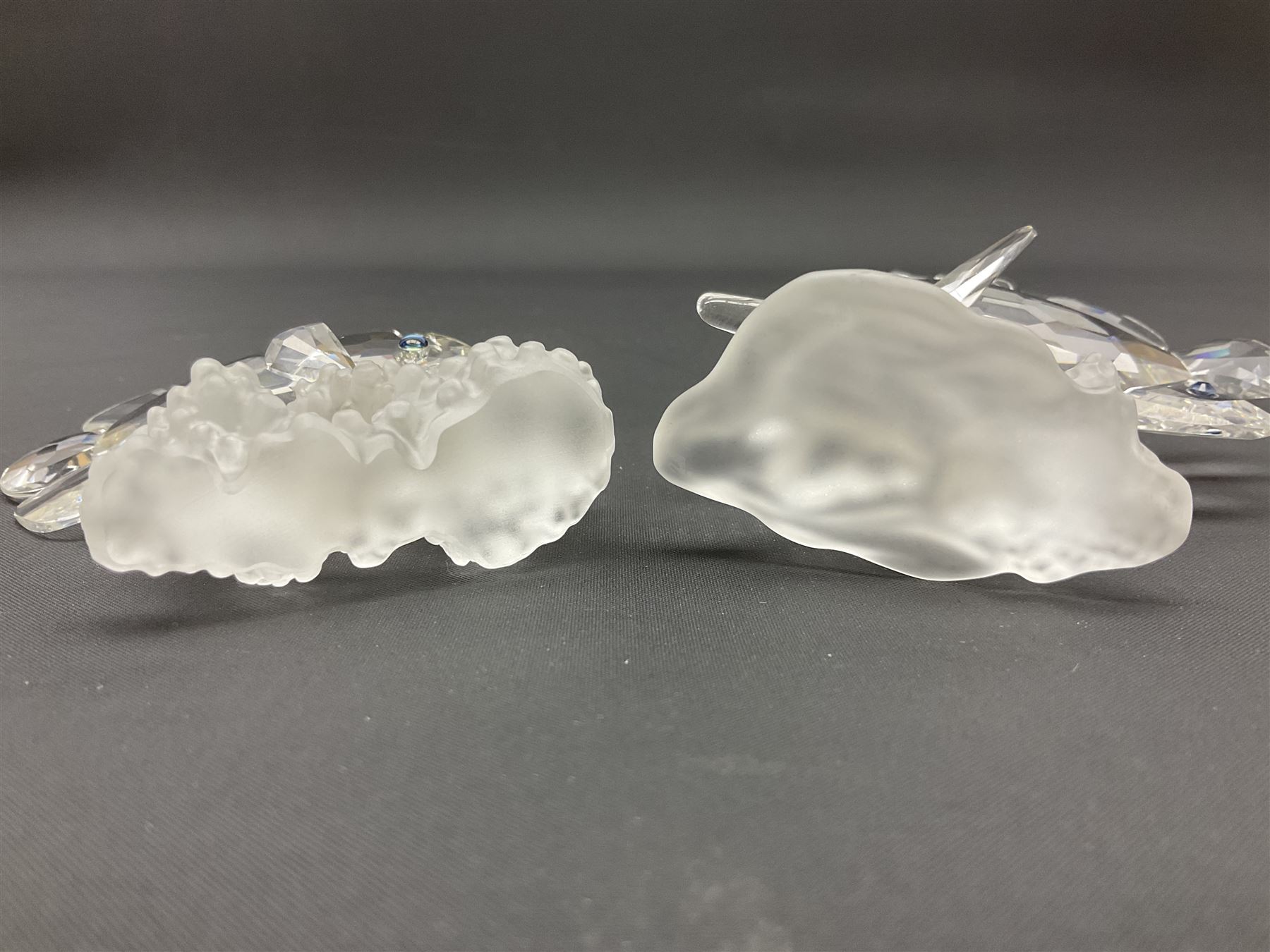 Swarovski Crystal sea creatures, comprising lion fish and dolphin, both with coloured elements, together with two seahorses, two small fish groups, butterfly fish, longnose butterfly fish and six coloured shells, tallest H8.5cm