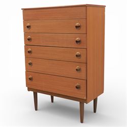 Mid 20th century teak dressing chest, rectangular top hinged to reveal a fitted interior with divisions and a rectangular mirror to the underside, over five long drawers with recessed circular handles, raised on tapering supports