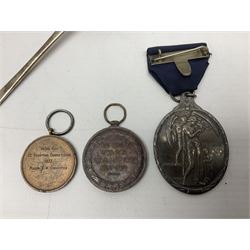 Two silver Georgian tablespoons, approximate total weight 3.36 ozt (104.7 grams), together with Great War Peace Medal 1919 and two others 