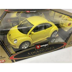Two Bburago 1:18 scale die-cast models - Volkswagen New Beetle 1998 and Volkswagen Kafer-Beetle 1955; Corgi CC99109 Cooper 'S' three-piece set on dashboard stand; Saico 1956 Morris Minor 1000 limited edition twin-pack; and Corgi limited edition 59564 Guinness Scania Tanker and Drop-side lorry set; all boxed (5)
