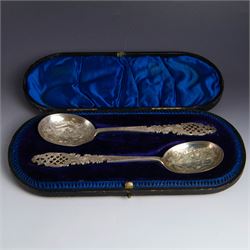 Pair of Edwardian silver serving spoons, each with pierced and engraved lattice and foliat...