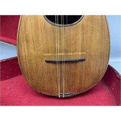 Early 20th century Italian Rafaele Disantino eight-string mandolin with two-piece back and spruce top with stamped Rafaele Disantino signature; bears maker's label L61cm; in wooden carrying case