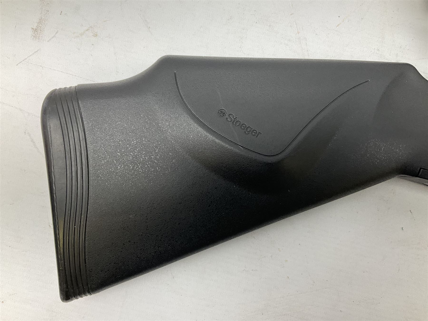 Stoegar .177 air rifle with break barrel action, 3 x 9 telescopic sight and fully integrated sound moderated barrel, no visible serial number, L109cm; in Stoeger lined gun sling