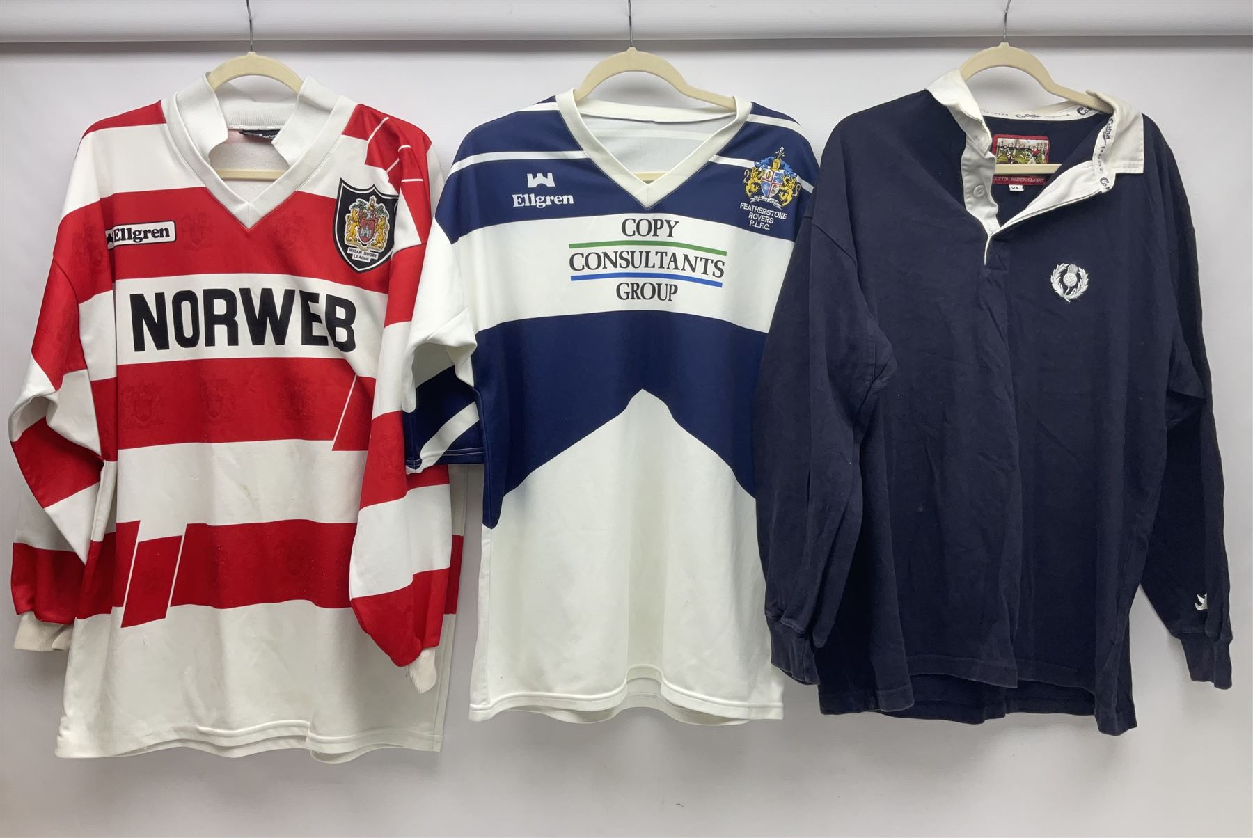 Eighteen Rugby League shirts, including Wigan, Leeds, Warrington and Huddersfield, etc and a Scotland international shirt