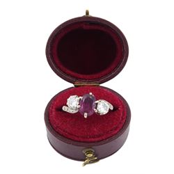 18ct white gold three stone oval ruby and round brilliant cut diamond ring, with diamond set shoulders, stamped, ruby approx 1.15 carat, total diamond weight approx 0.55 carat, in silver top ring box by The Victorian Ring Box Co, Edinburgh 1993 