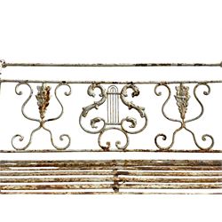 Regency design wrought metal garden bench, central lyre back with foliate S-scrolls with serpent masks, flanked by two floral mouldings and further scrolling, metal slatted seat on straight supports joined by H-stretcher  - THIS LOT IS TO BE COLLECTED BY APPOINTMENT FROM DUGGLEBY STORAGE, GREAT HILL, EASTFIELD, SCARBOROUGH, YO11 3TX