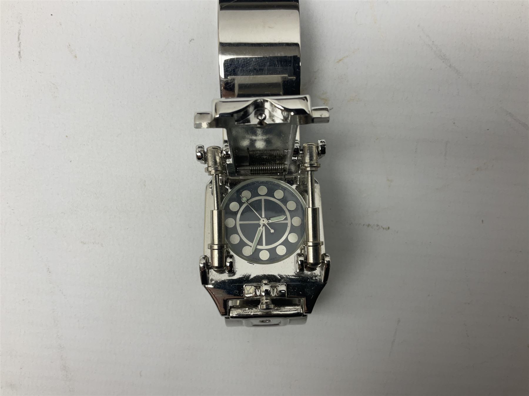 Four X Data stainless steel wristwatches, two Marc Gay wristwatches and one other, all with cover plates