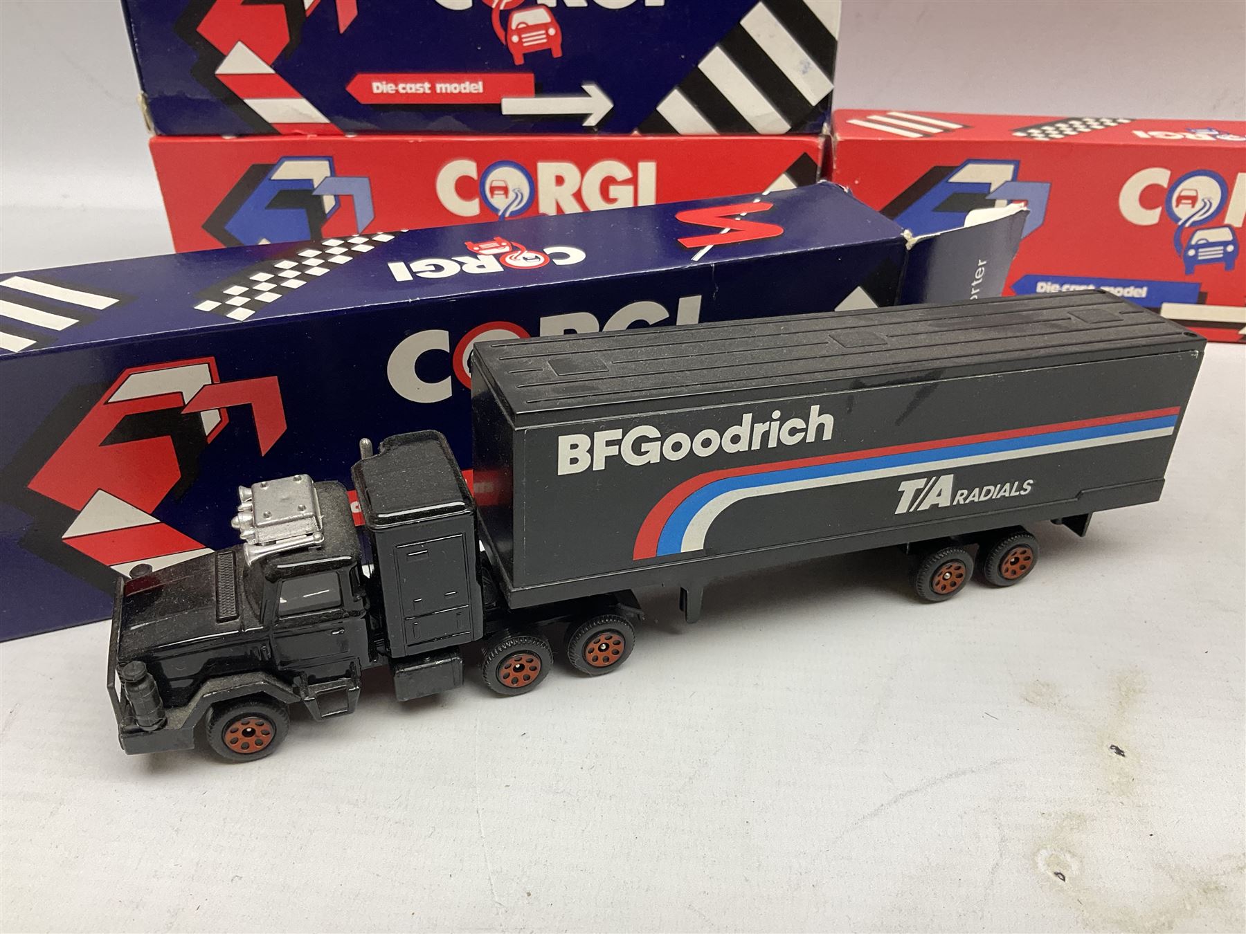 Corgi - thirty-four modern die-cast models including cars, commercial vehicles, racing cars, sports cars, car transporters etc; all boxed; Bburago boxed set of five cars; four Matchbox Originals blister packs etc