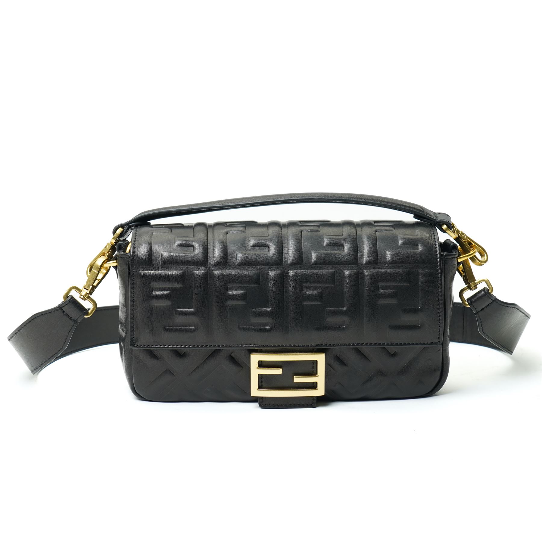 Fendi Baguette shoulder bag, black nappa leather with embossed FF monogram and quilted panels, the front flap secured by a gold-tone FF logo magnetic clasp engraved Fendi Made in Italy, with detachable leather shoulder strap and gold-tone hardware, interior leather tab stamped 'Baguette Fendi Made in Italy', together with original Fendi dust bag and box, W27cm D7cm H15cm