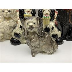 Two Pairs of Staffordshire style dogs, together with three other examples, largest example H27cm