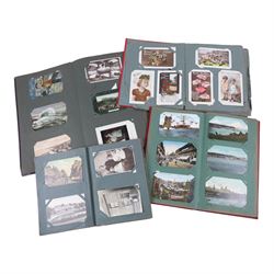 Collection of Victorian and later postcards and greetings cards, including black and white...