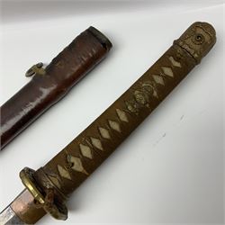 WW2 Japanese Army officer's shin gunto/katana sword with 67cm steel single edged blade, foliate cast brass tsuba, bound fish-skin grip with brass mounts, inscribed and painted marks to tang; in lacquered wooden scabbard with leather combat covering bearing four character marks L99cm overall