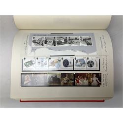 Queen Elizabeth II mint decimal stamps, face value of usable postage approximately 2250 GBP, housed in three albums