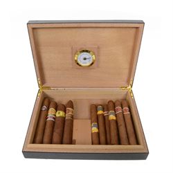 Collection of cigars, including Montecristo, Cohiba, Diplmaticos, and other cigars, within...