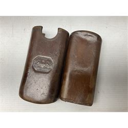 Victorian leather cigar protector with metal match striking plate on the end and internal spring to hold the cigars in place; expands for differing lengths of cigar, minimum L12.5cm; another similar leather cigar case marked Middlemore's Patent with attached vesta case and striker; three Bryant & Mays tin-late matchbox holders including 1935 Jubilee; and small box of matches (6)