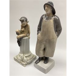 Two Royal Copenhagen figures, the first example modelled as a fisherman 3668, the second example modelled as a fawn seated upon a column 456, largest H26cm.