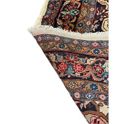 Persian Bidjar ivory ground carpet, decorated all-over with stylised floral motifs and interlacing branch, five band border decorated with flower heads 