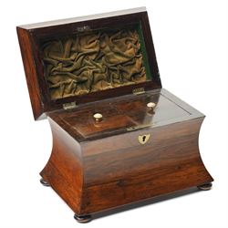 Early 19th century rosewood tea caddy of waisted sarcophagus form, twin compartments, on compressed bun feet, brass keyplate, H17cm W22cm 