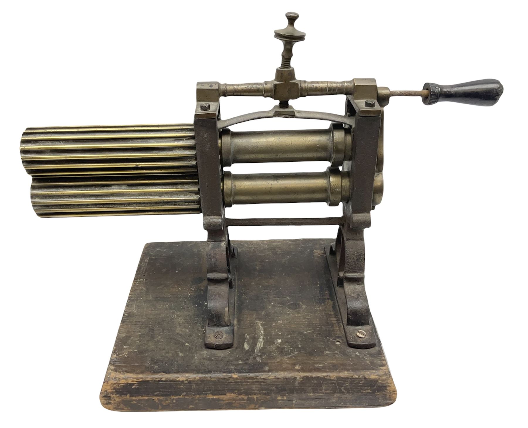Victorian cuff and collar tabletop mangle, the ribbed brass rollers in a cast iron frame mounted on a wooden base