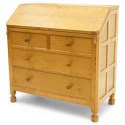 Mouseman - oak adzed bureau, fall front with carved mouse lopers, with fitted interior, above two short over two long drawers, by the workshop of Robert Thompson of Kilburn
