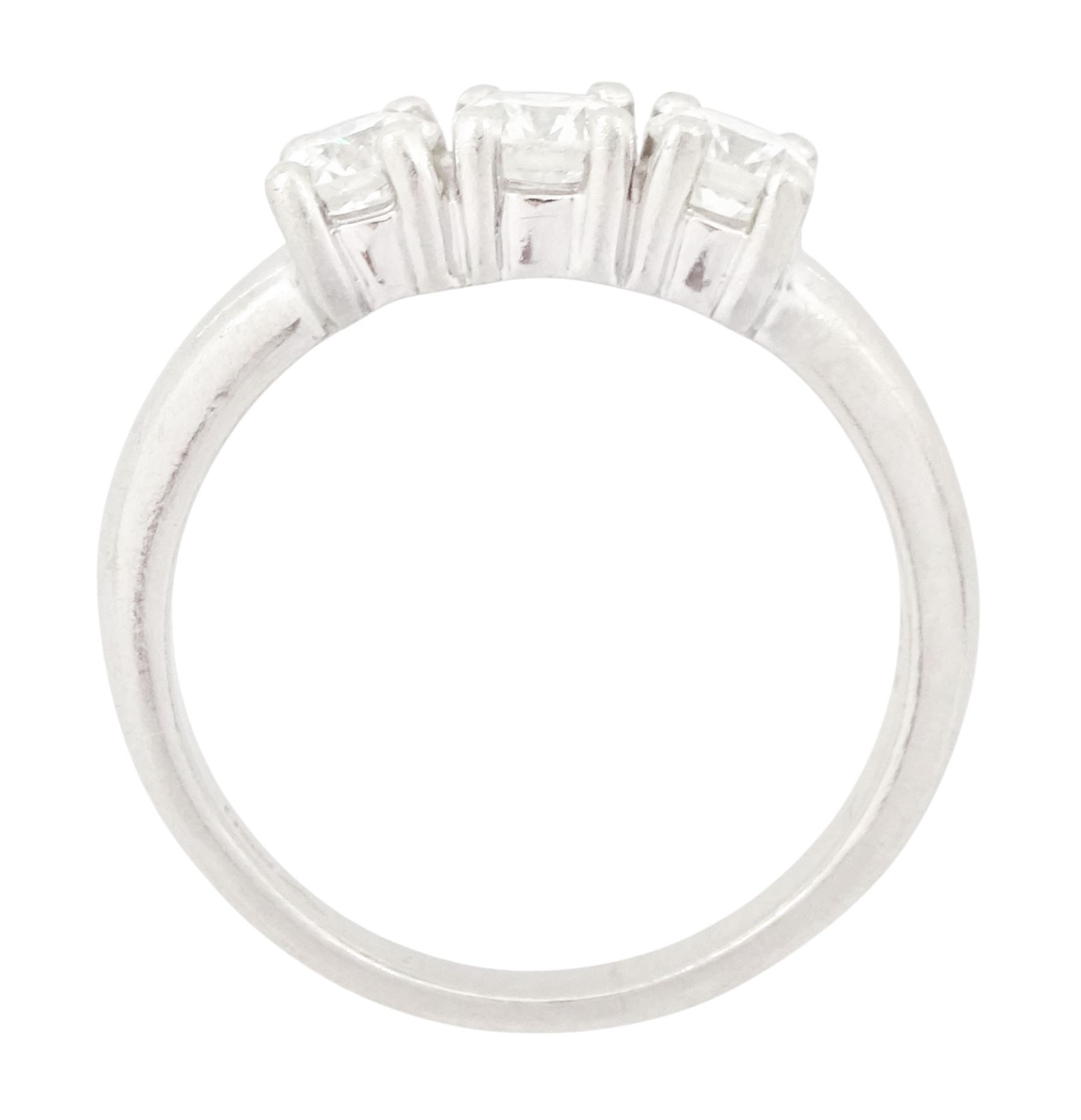 Platinum diamond three stone ring, each four claw set with a round brilliant cut diamond, hallmarked, total diamond weight approx 1.00 carat