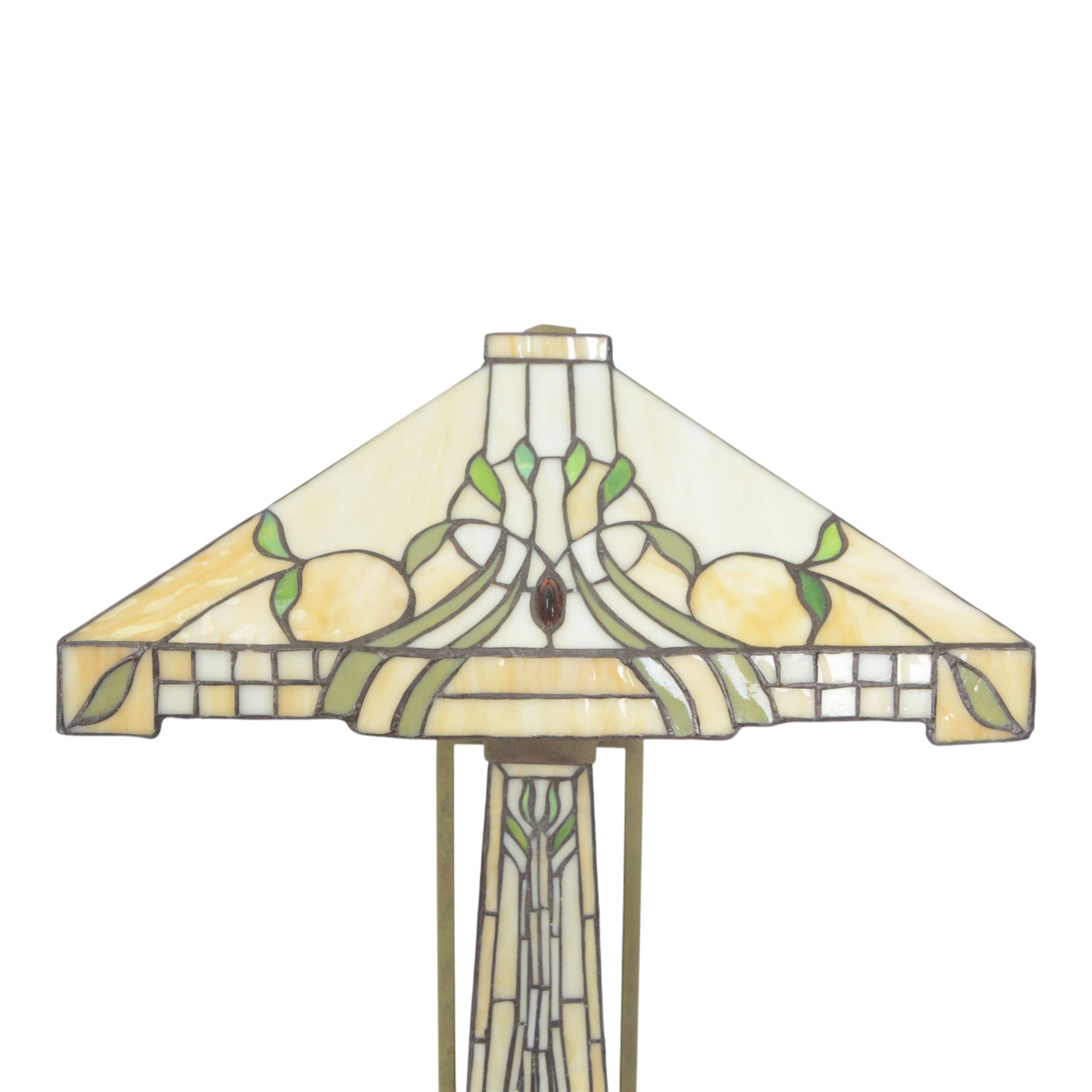 Tiffany style table lamp, the tapering stem and stepped pyramid shade, with naturalistic green foliate decoration on a cream ground, including shade H67cm
